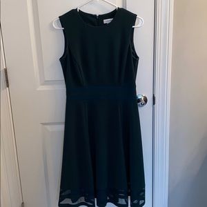 A once worn Calvin Klein dark green dress.